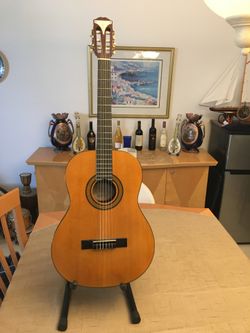 Epiphone Pro-1 Classical Acoustic Guitar The Epiphone PRO-1 Acoustic Collection of guitars provides four stellar solutions. Drawing on a combined 260 