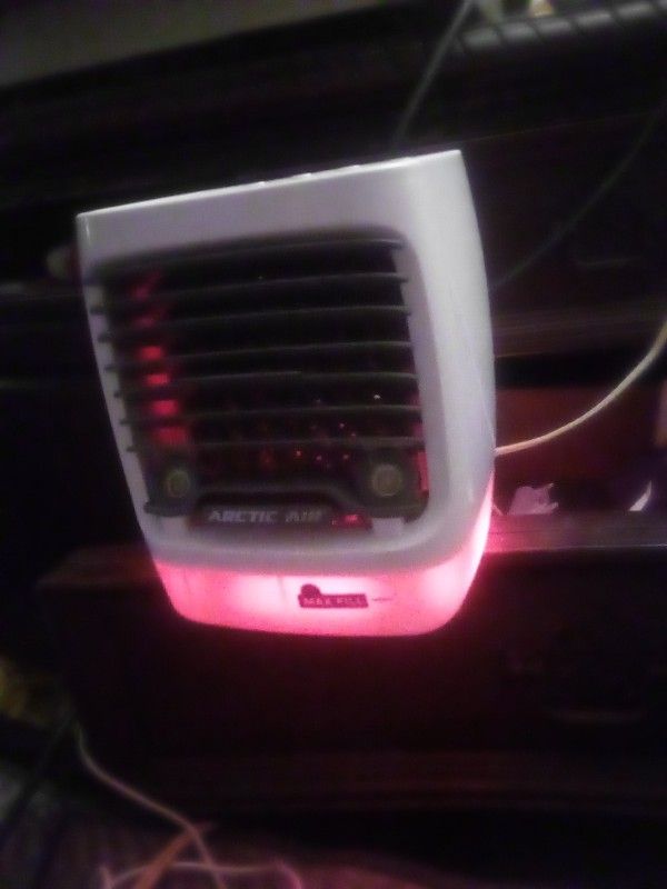A Nice Air Conditioner Fan Lights Up Different Colors