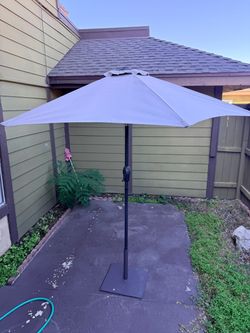 Patio umbrella with base