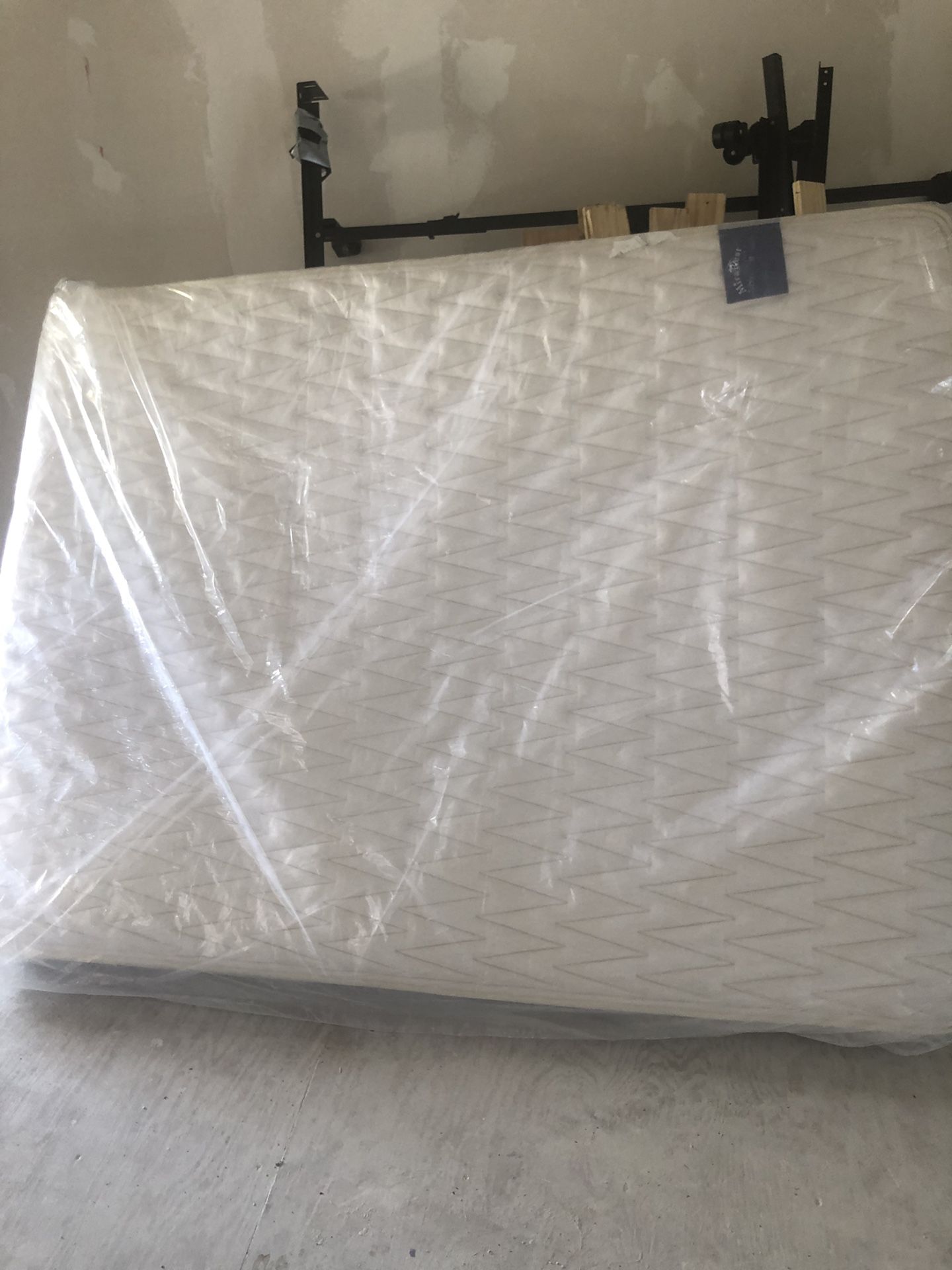 Queen mattress like new , still in original plastic bag
