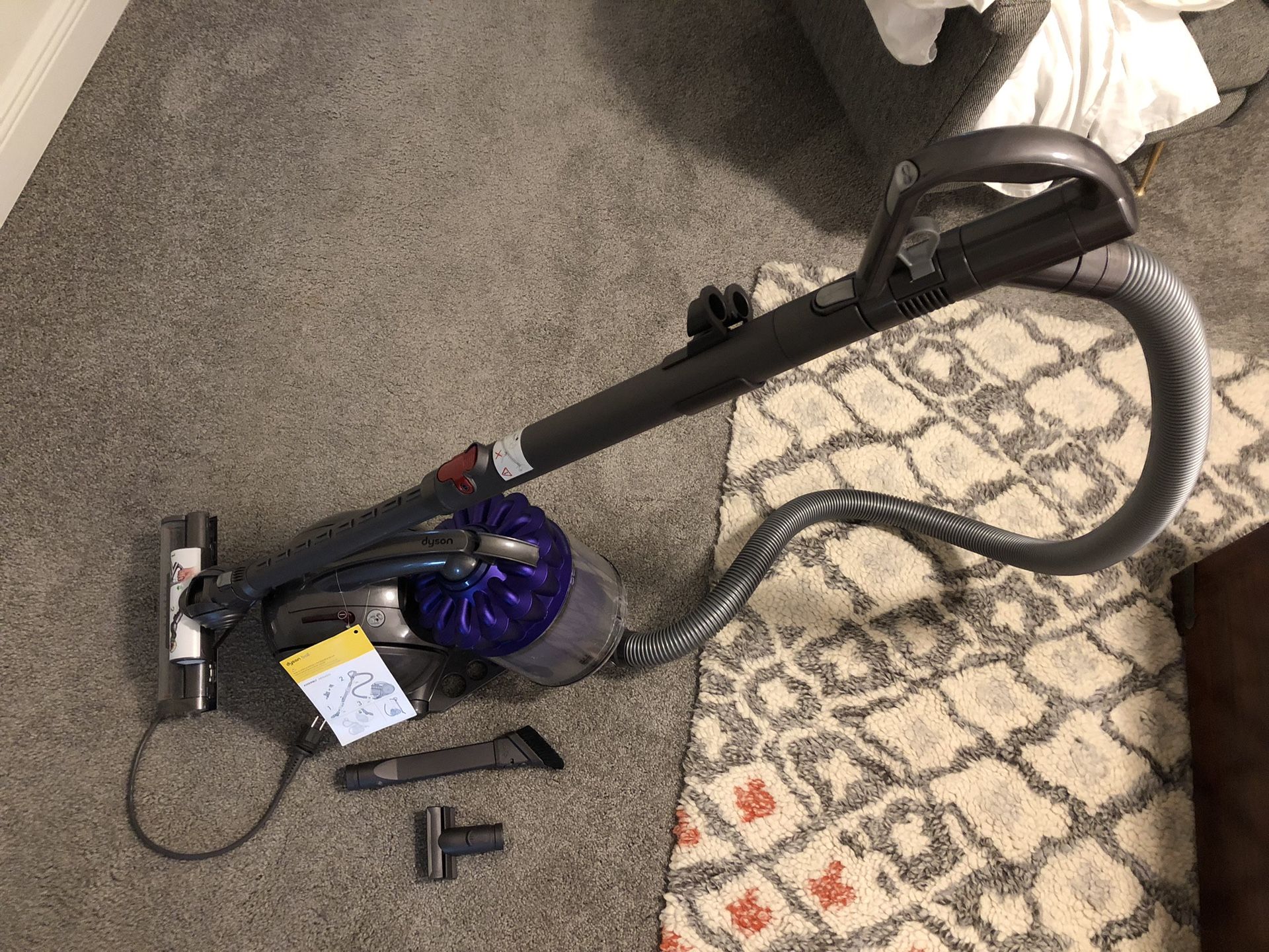 Dyson Dc39 Canister Vacuum. Lightly used with tools and new filter. Clean.