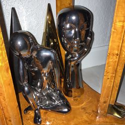 $30 Ea Statue: Black Hand. Leather Zebra. Silver Art Deco Face. Lion. Gold Peace Sign. Triple Chinese Buddha Head Concrete Candle Holder. Dragon.