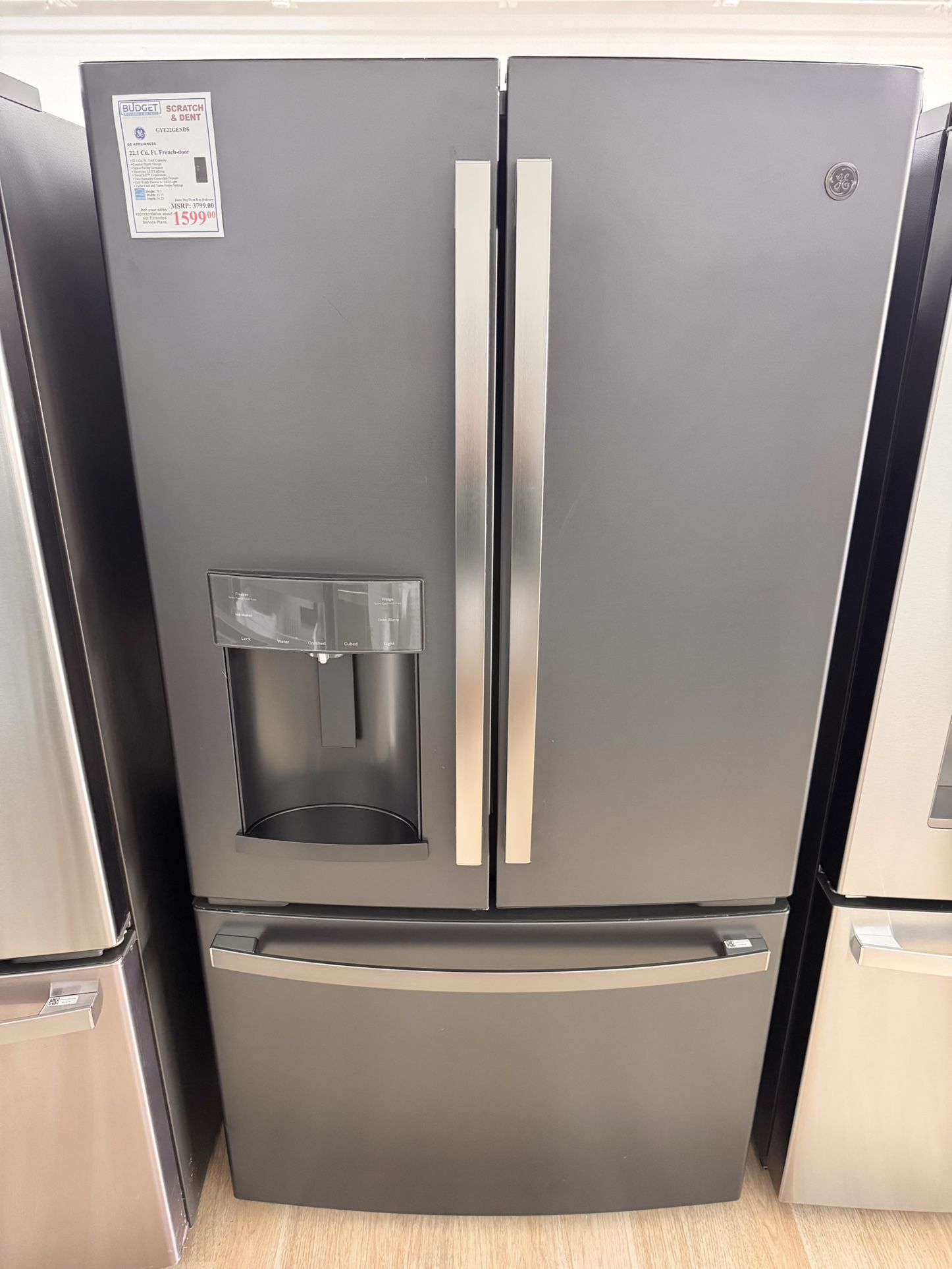 New GE 22.1 Cu. Ft. Counter-Depth French-Door Refrigerator  Model #:GYE22GENDS