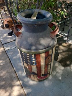 Decorated milk can $100