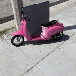 Pink razor moped