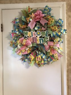 Spring Wreath. Deco means ribbon, bows and sign. Need something different let me know.