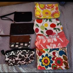 makeup bags and 3 wallets
