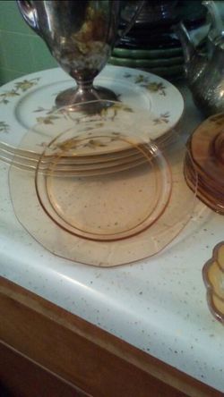 Pale apricot colored salad dishes with octagon edge and opalescent apricot serving dish