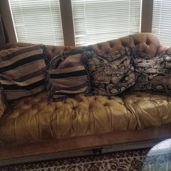 2 Couches With A Chair