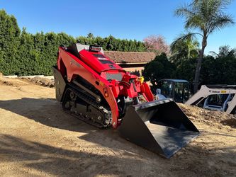 Mini skid steer stand behind compact track loader