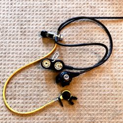 Complete scuba diving regulator set up with gauges.