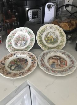 These four plates are Royal Doulton. A series of four seasons plates from the Brambly Hedge Gift Collection