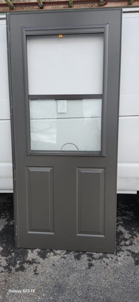 New Anderson 36 inch storm door Brown.