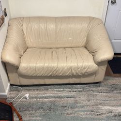 Cream Leather Love Seat/ Couch