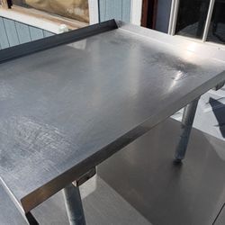 Small Stainless Steel Table,has a  few scratches on top. $40