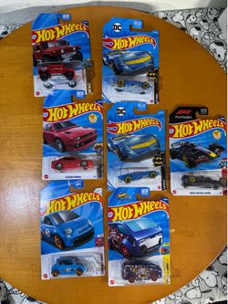 Hot Wheels Lot of 7 – Batman, Formula 1, Maserati, Humvee & More (Sealed)