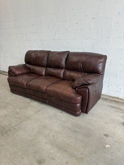 Brown leather recliner sofa couch