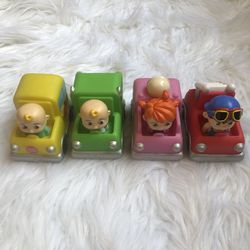 Four colorful Cocomelon toy cars for toddler/kids