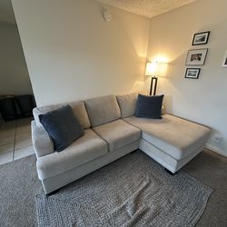 Beige Sectional Sofa with a chaise lounge