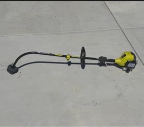 Ryobi 25 cc 2-Stroke Attachment Capable Full Crank Curved Shaft Gas String Trimmer