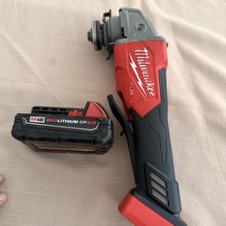Milwaukee grinder & battery 100