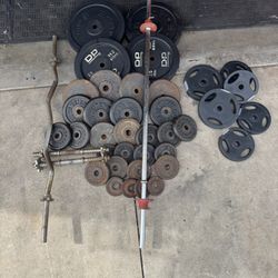 Standard weights 280lbs total plus curl bar and 5ft bar plus adjustable dumbbells