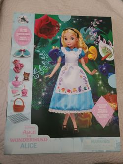 Disney  Alice in Wonderland  Story Doll with accessories and activities.  Brand new