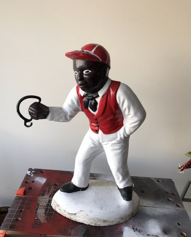 Black lawn jockey