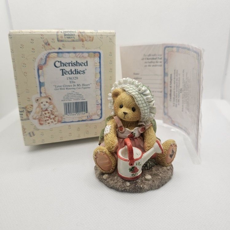 New 1995 Cherished Teddies ELLA Love Grows Girl Bear Figurine Hat Watering Can
MINT CONDITION, STORED IN THE BOX, COMES WITH ORIGINAL PACKAGING
EL