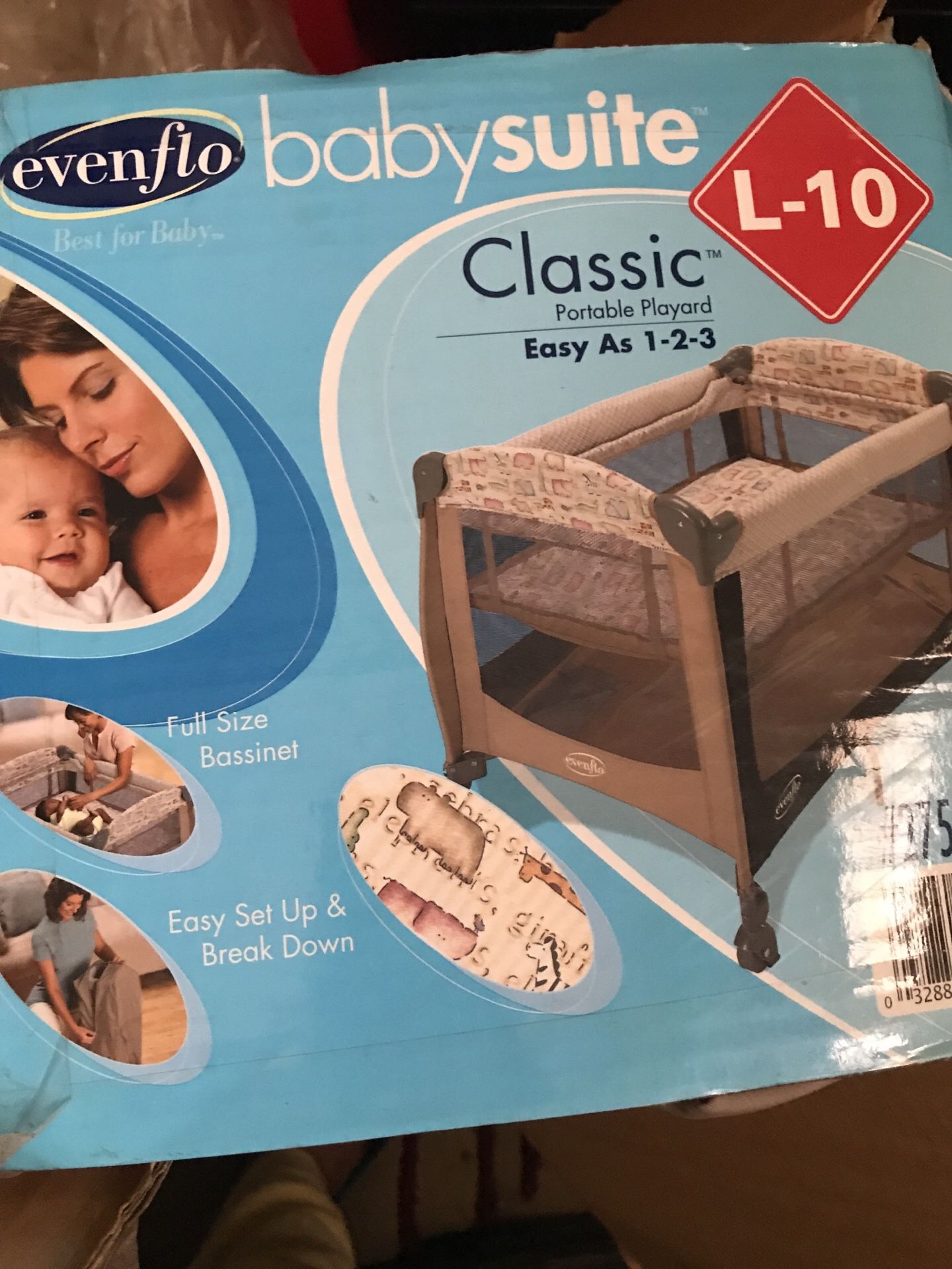 Open box evenflo pack and play