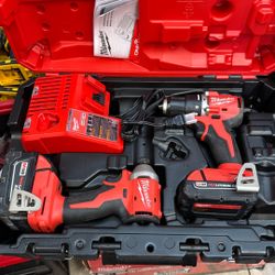 Milwaukee M18 Brushless Hammer Drill And Variable Speed Impact With 2 Batteries And Charger