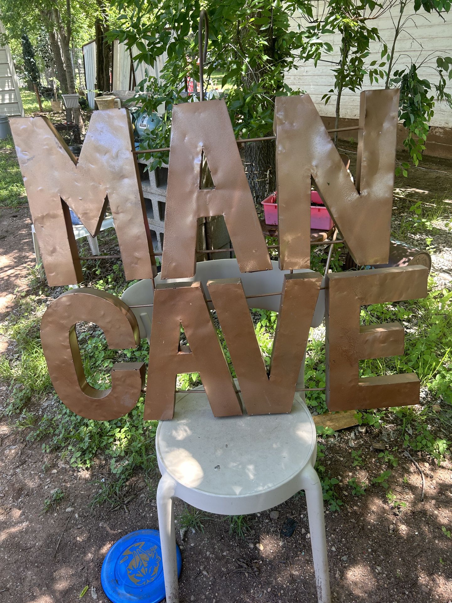 Metal Man Cave sign its 36 inches tall and 35 inches wide 