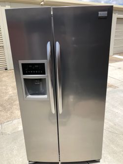 Frigidaire stainless steel refrigerator 1 year old