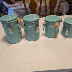 4 kitchen canisters with scoops