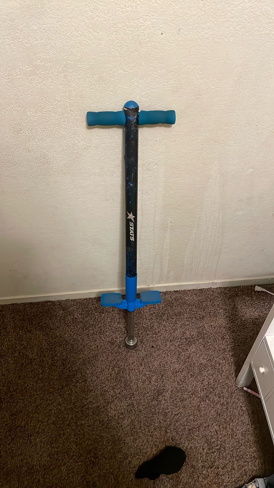 Blue pogo stick