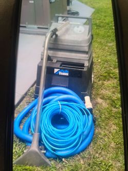 Carport shampoo machine.
