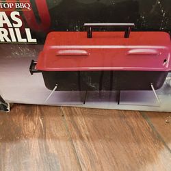 Barbecue Grill And A Free Propane Tank