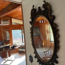 An antique mirror The size Is 25 1/2x48