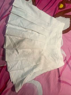 White pleated skirt
