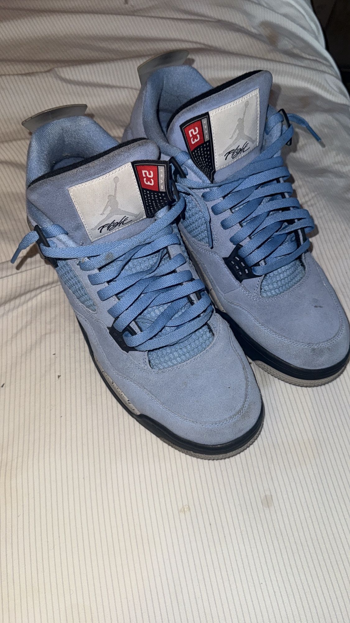 University Blue Jordan 4