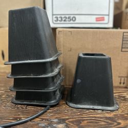 5 heavy-duty plastic bed or furniture risers.