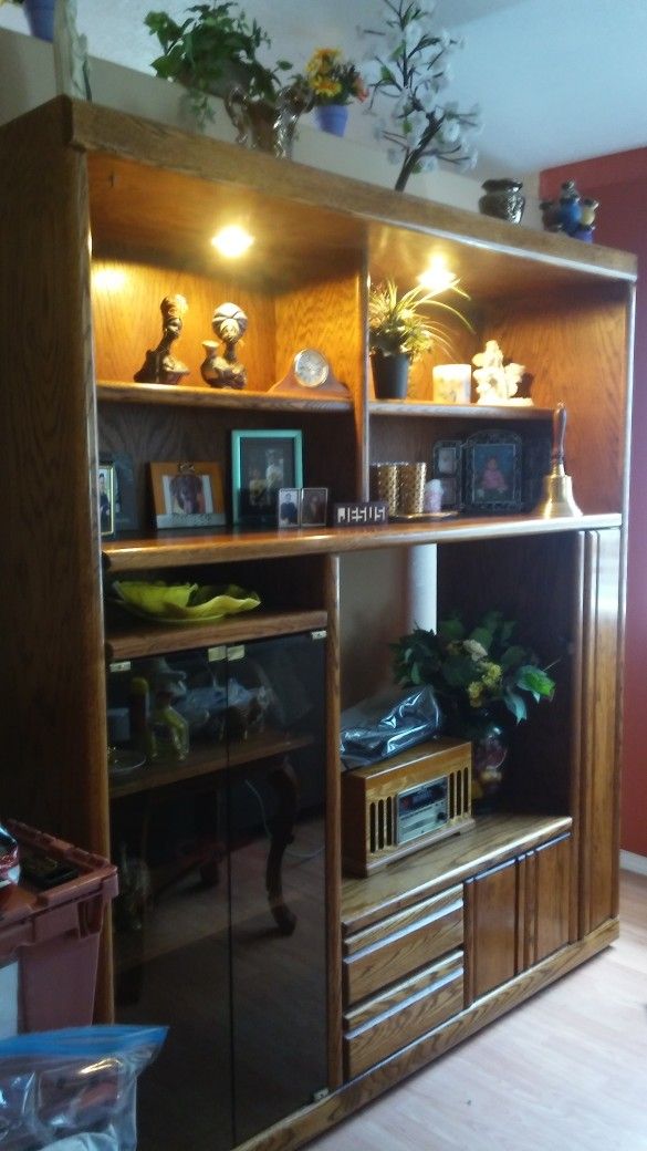 Wood Entertainment Center. Very well Kept.