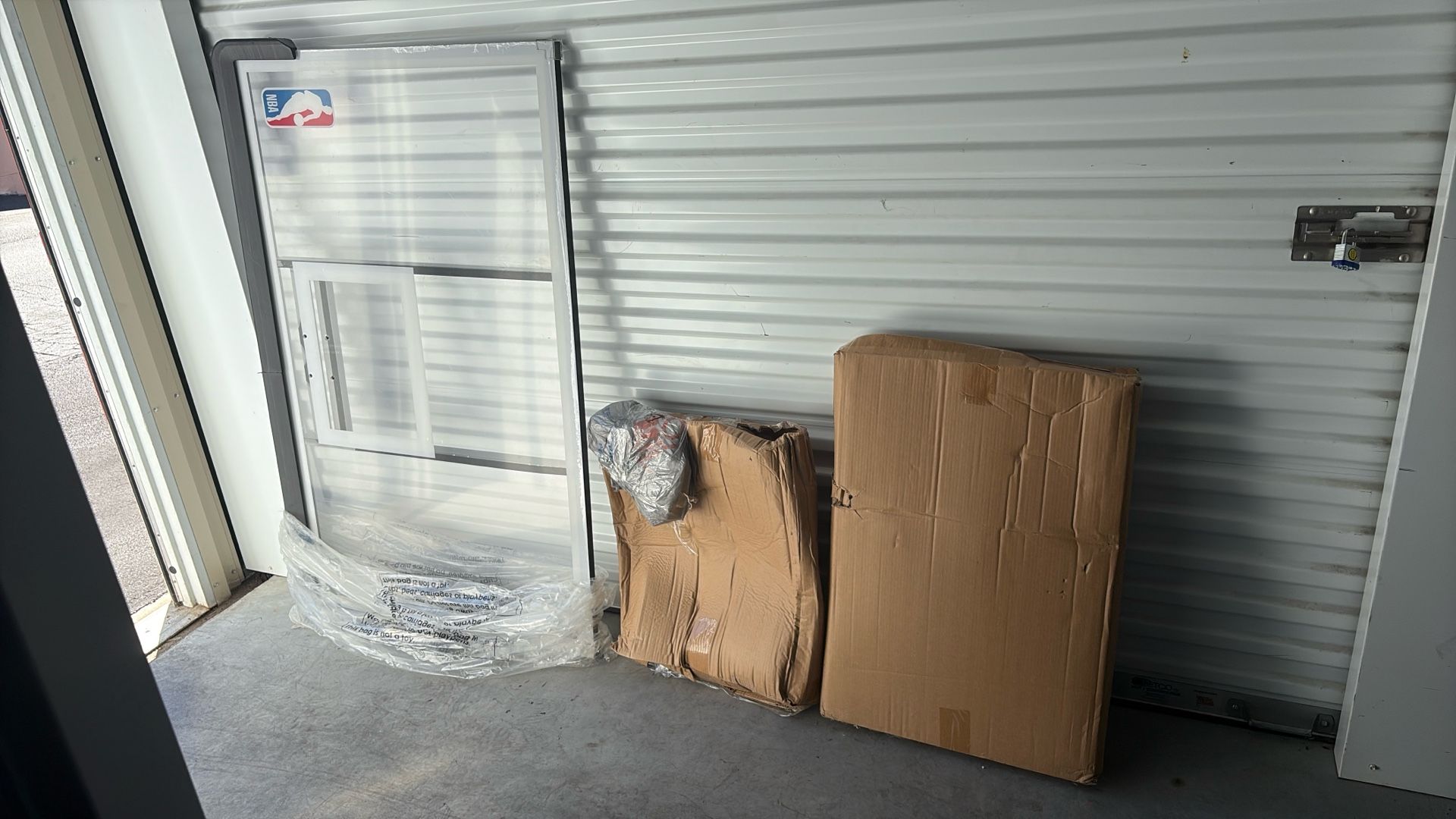 NBA Official 54 in. Wall-Mounted Basketball Hoop with Polycarbonate Backboard