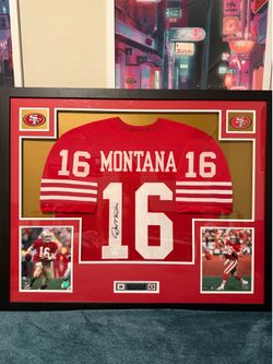 Signed Joe Montana Jersey in frame. JSA Authenticated