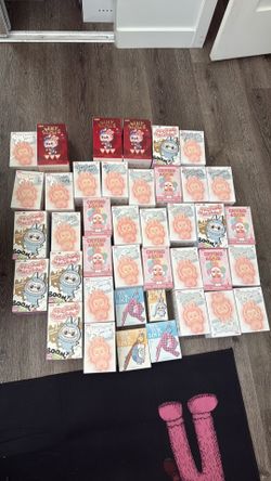 Collection of labubus and cry baby’s unopened