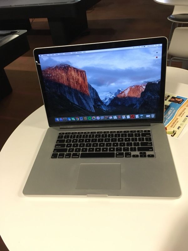 2015 MacBook Pro ʻ15 El Capitan {contact info removed} please text only