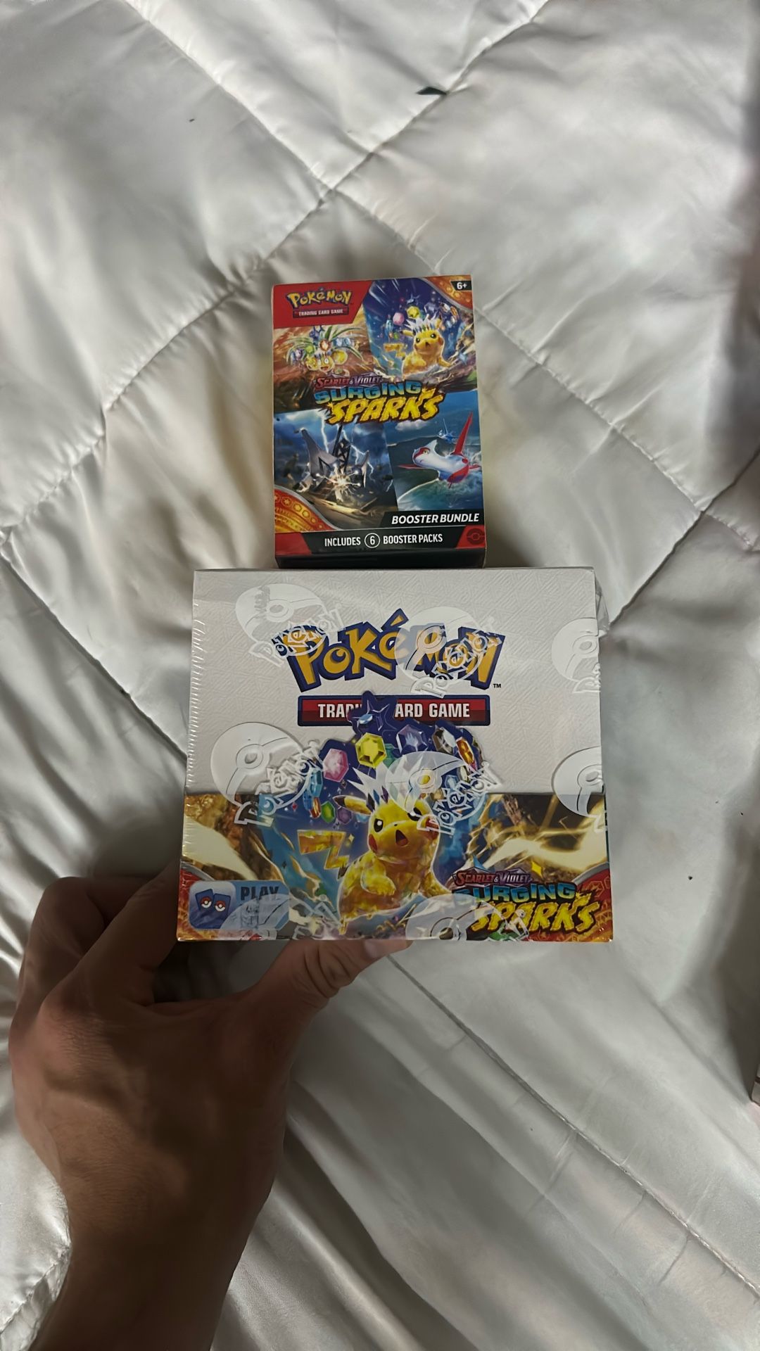 Pokémon’s Surging Sparks Booster Box And Booster Bundle