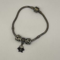 Silver tone charm bracelet - no markings - 7 inches - black butterfly 