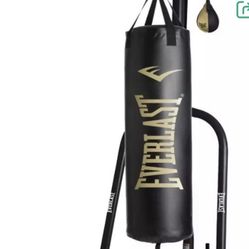 Punching Bag Stand and Plenty Of Gloves 