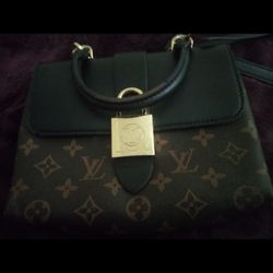 Louis Vuitton Locky Purse